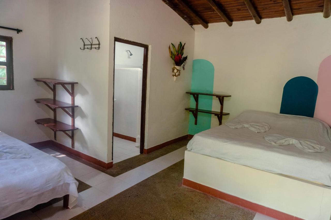 Los Robles Capurgana Hotel Стая снимка