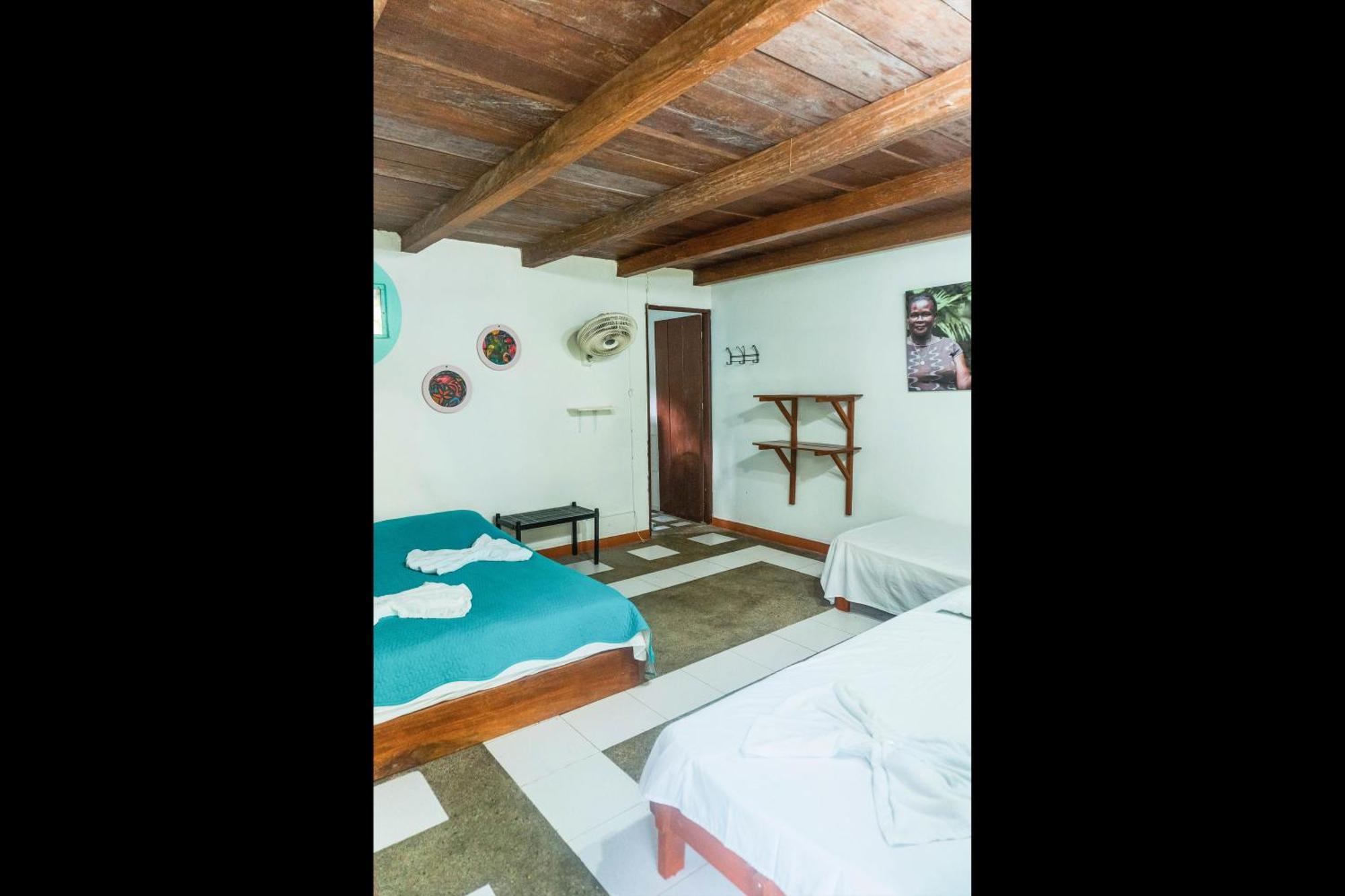 Los Robles Capurgana Hotel Стая снимка