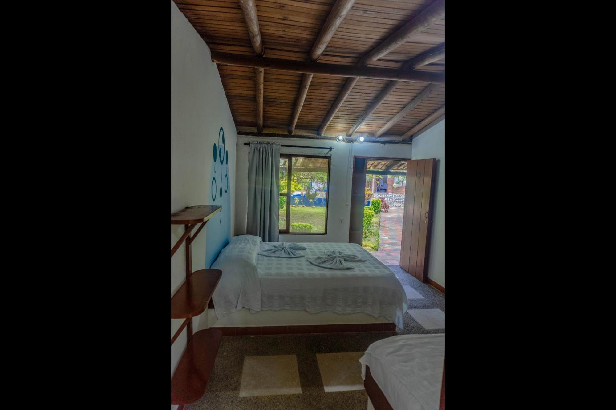 Los Robles Capurgana Hotel Стая снимка