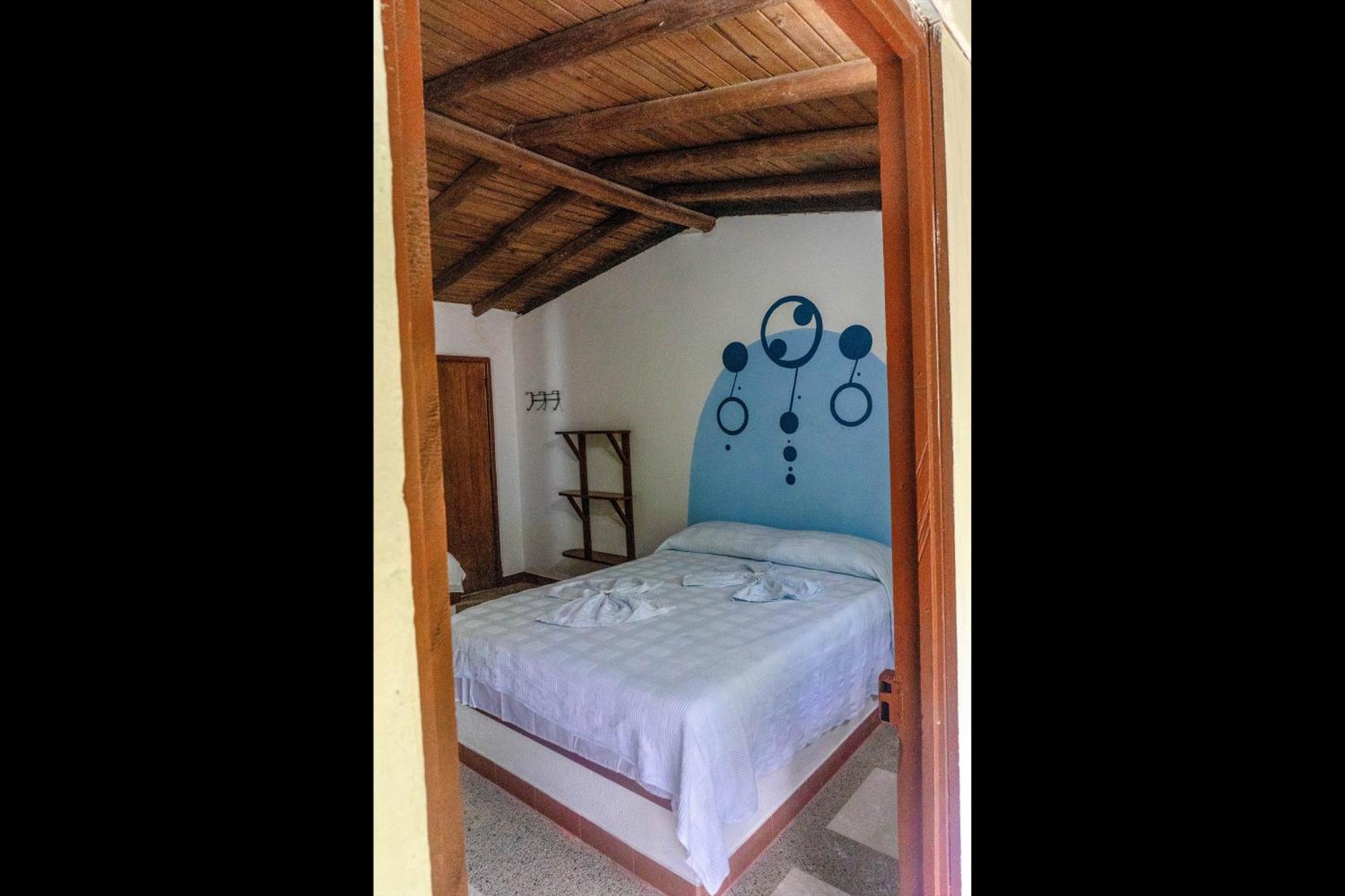 Los Robles Capurgana Hotel Стая снимка